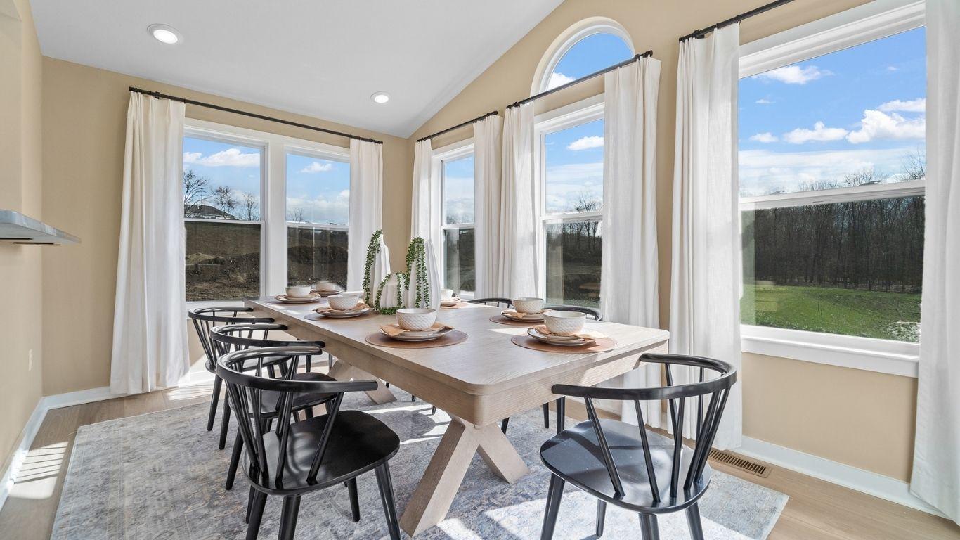 Choose a sunroom to elevate your everyday dining and fill your first floor with natural light.