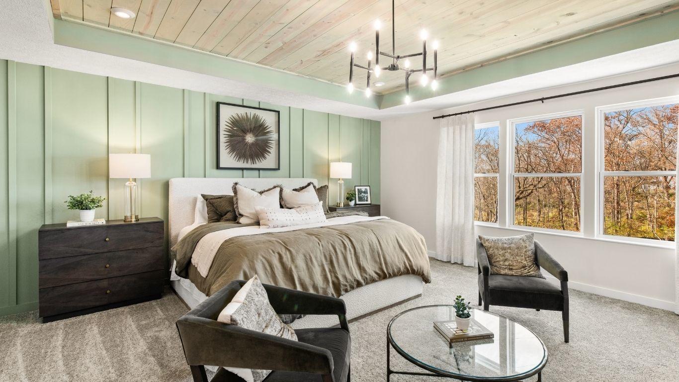 The bedroom you deserve with walk-in closet and a place to relax after a busy day.