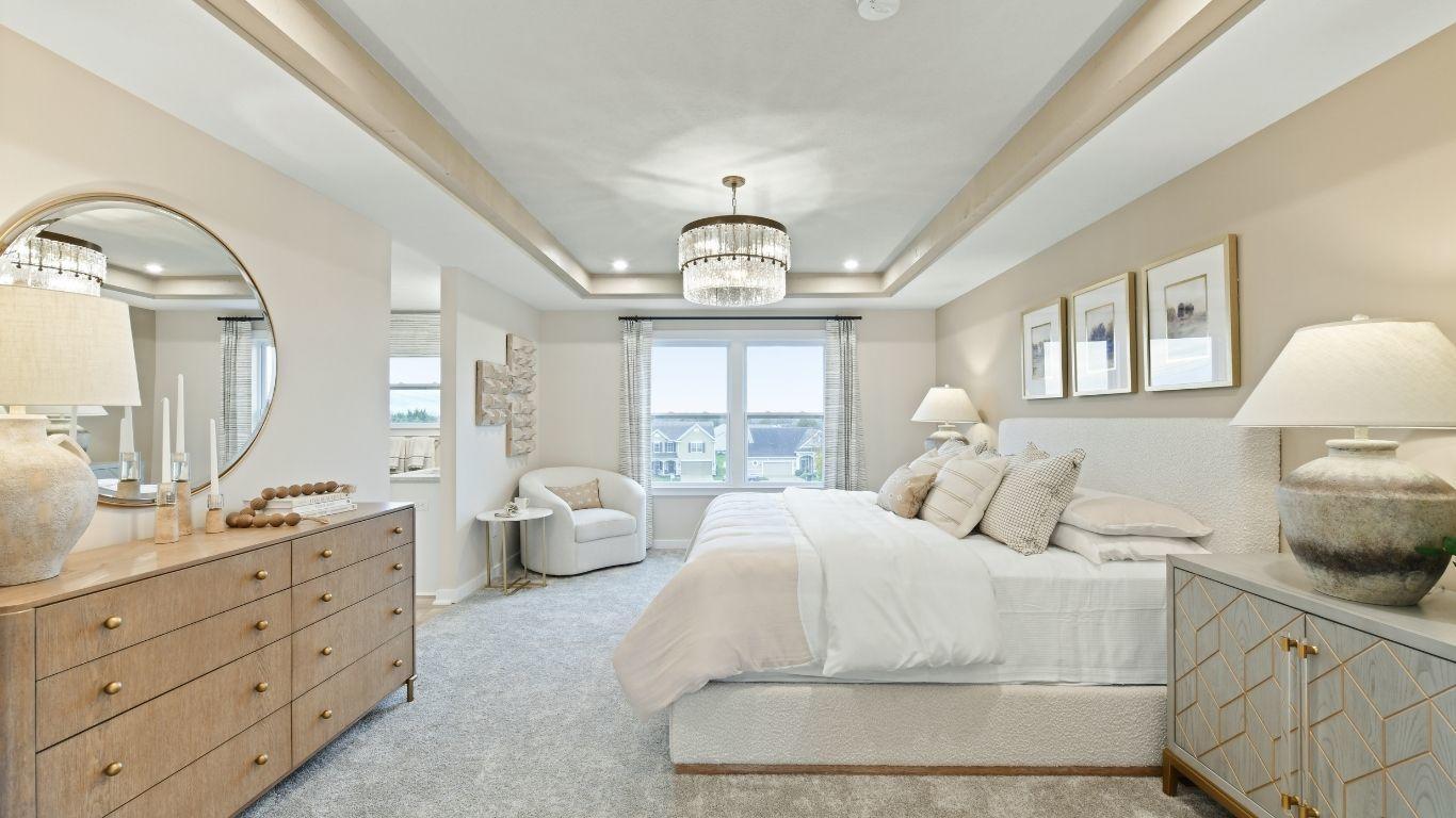 Rest easy in a spacious master suite with room for a reading nook.
