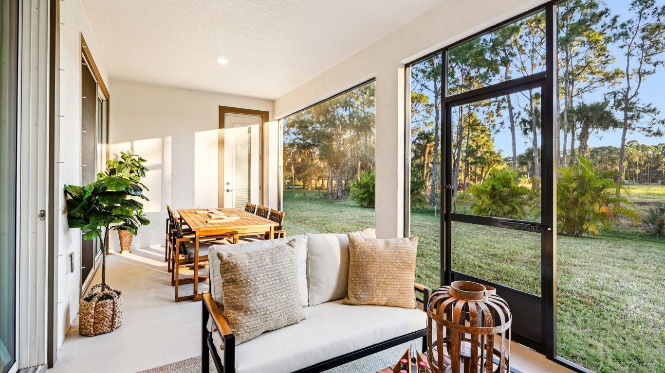 Elevate outdoor living with a screened lanai—ideal for morning coffee, gatherings, and relaxation.