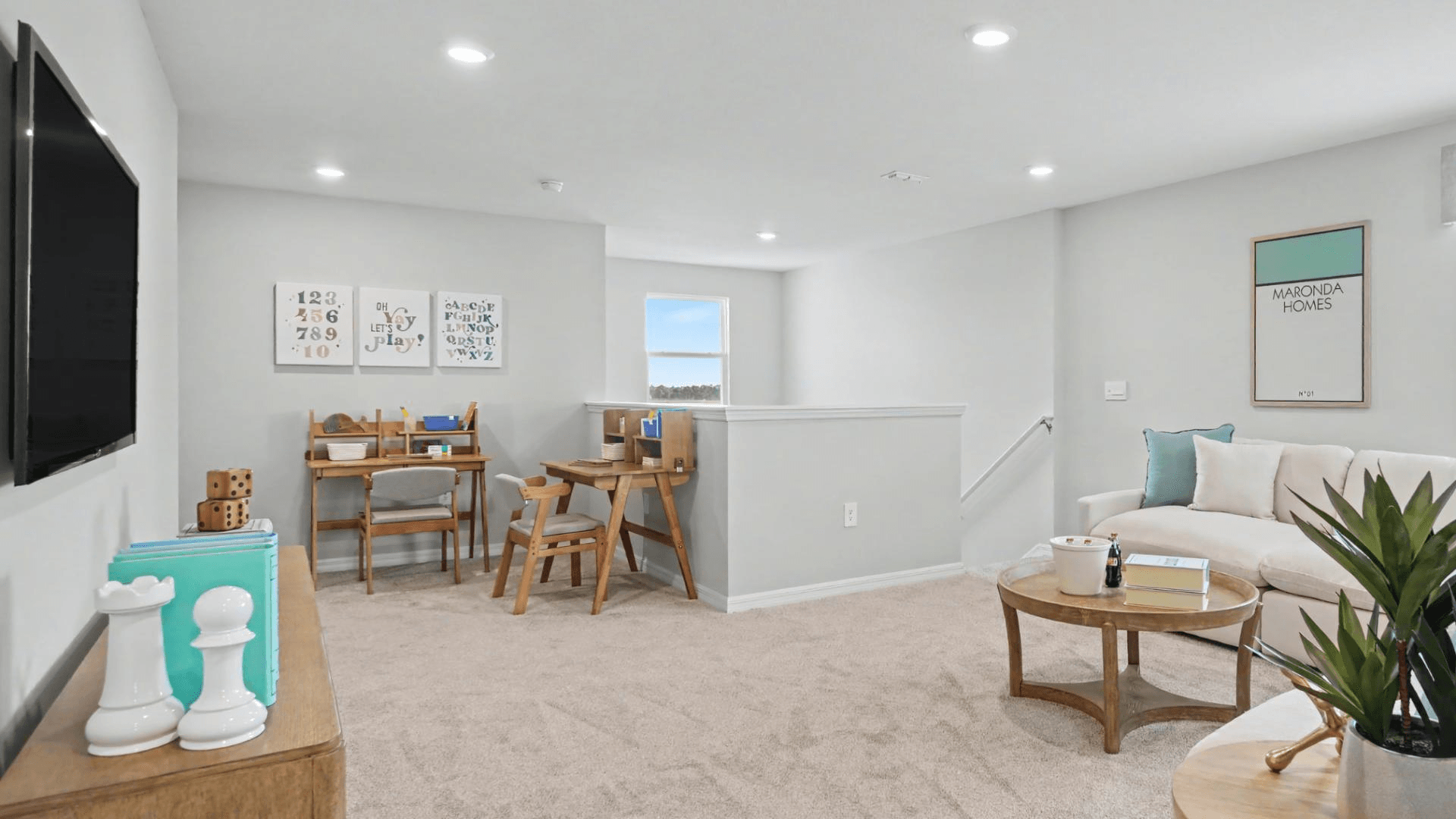 The 2nd-story loft is the extra space where life happens - movie and game nights await.