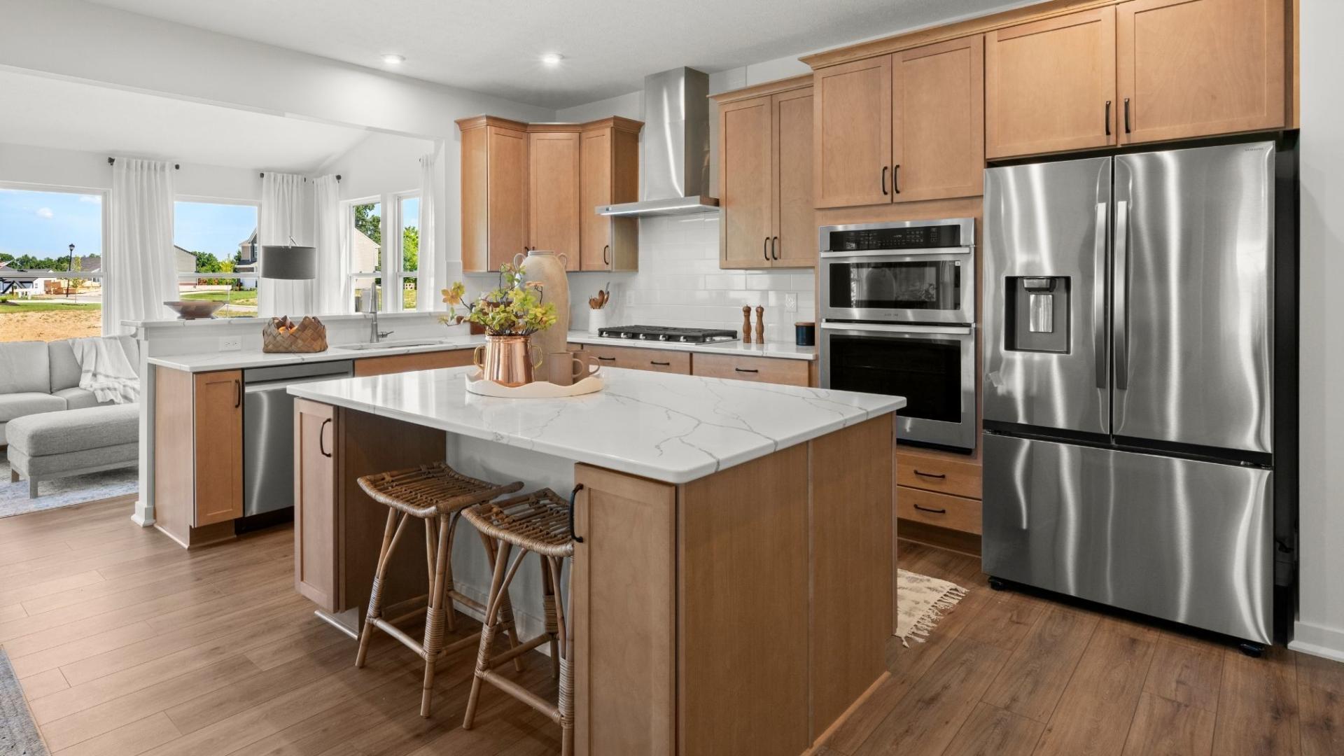 You’ll have added storage and workspace with a kitchen island included on every home!
