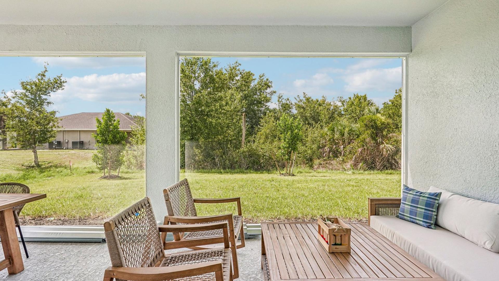 lIndoor comfort meets outdoor charm on your included lanai.
