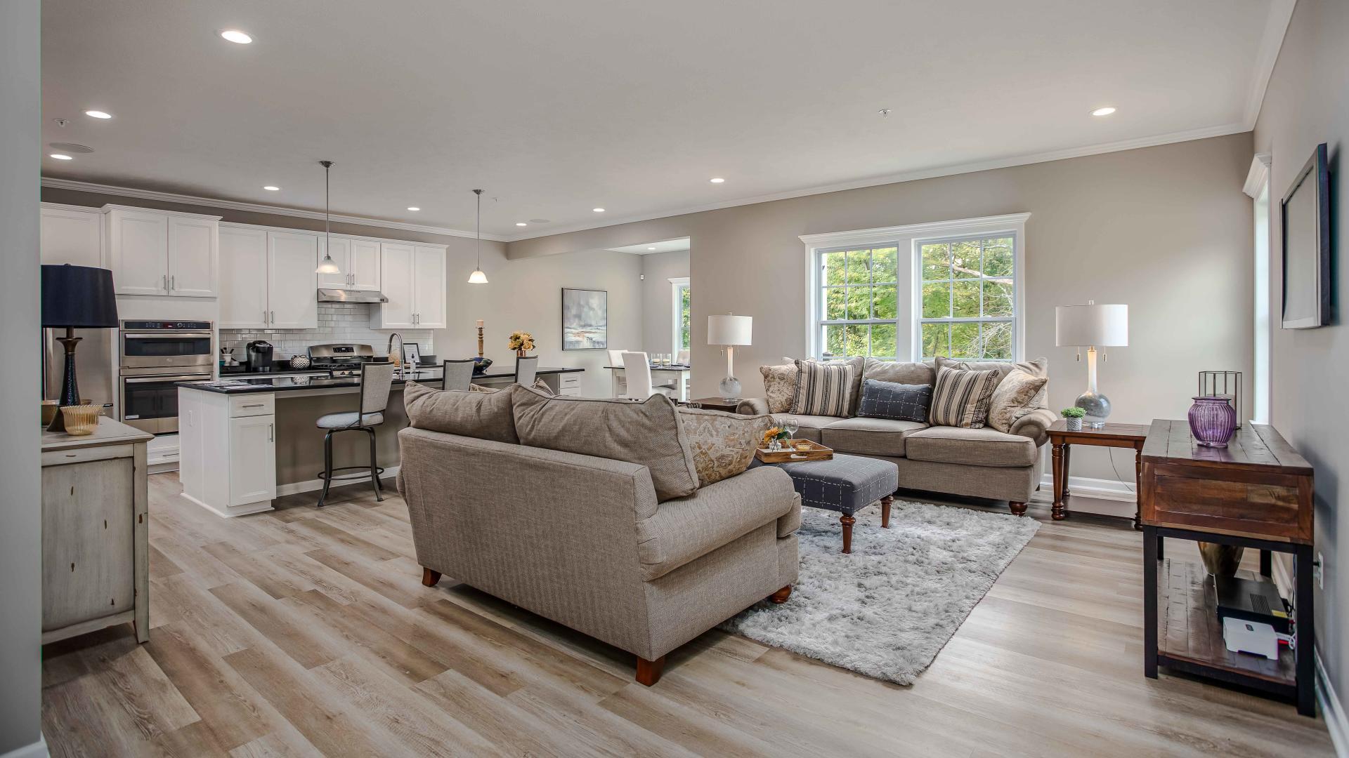 The family room and kitchen flow seamlessly into one another, making the first floor of your home the space where everyone wants to gather.