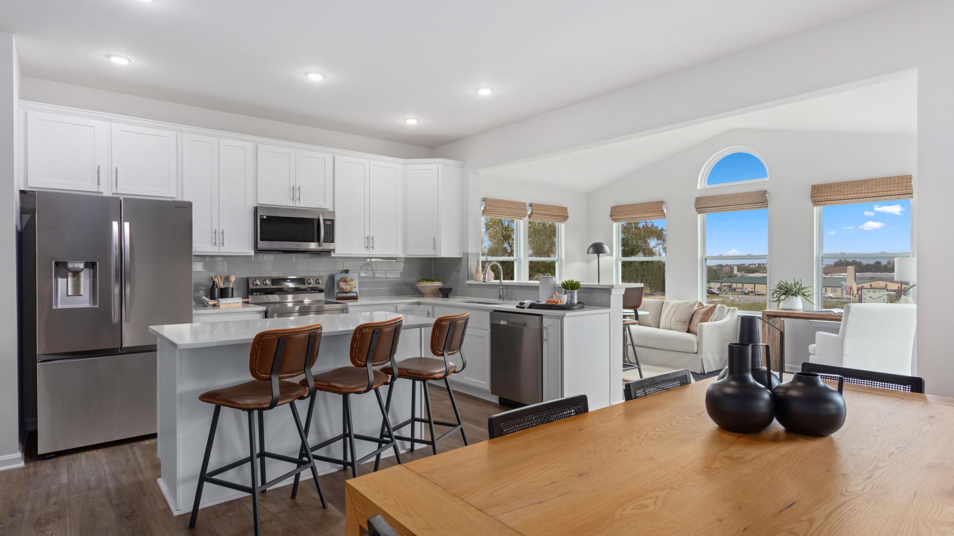 Your new kitchen has it all - Granite countertops, LVP flooring, and stainless steel appliances.