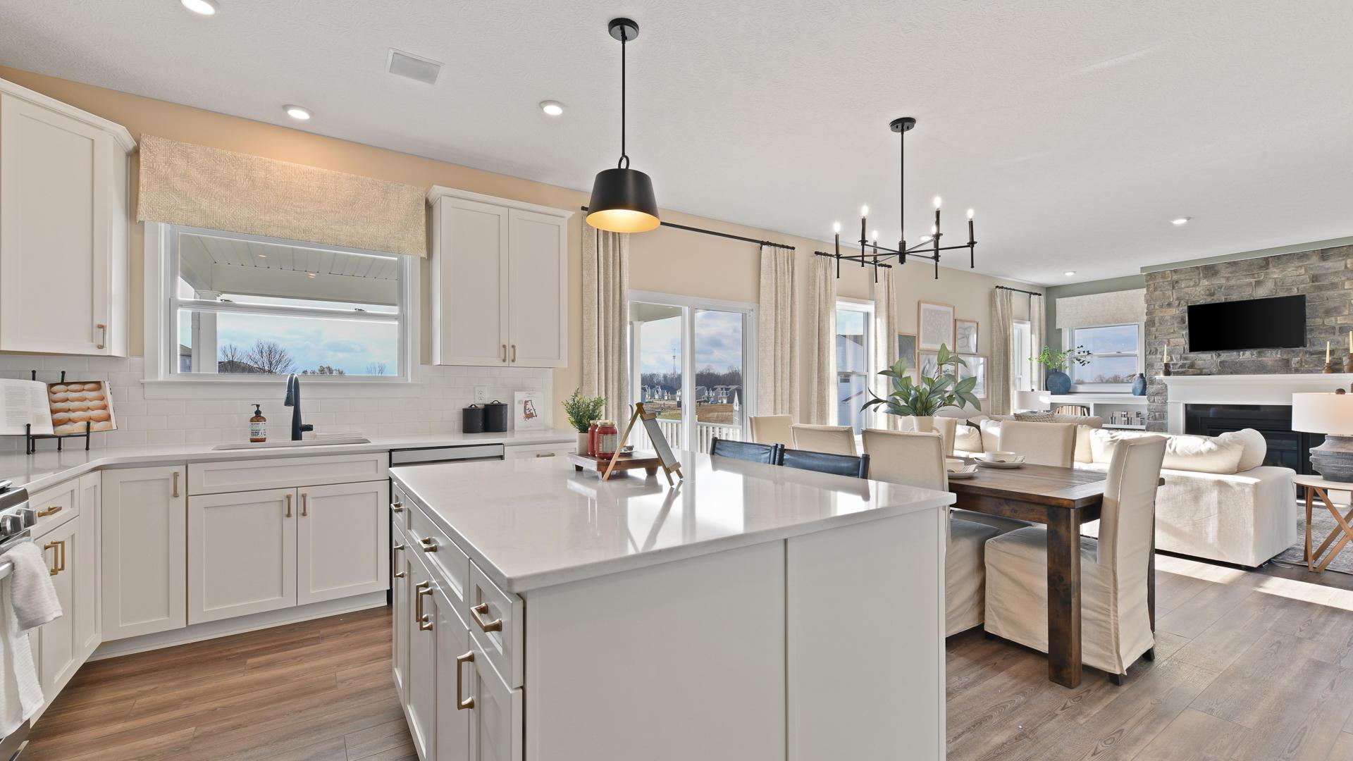 Your new kitchen has it all - Granite countertops, LVP flooring, and stainless steel appliances.