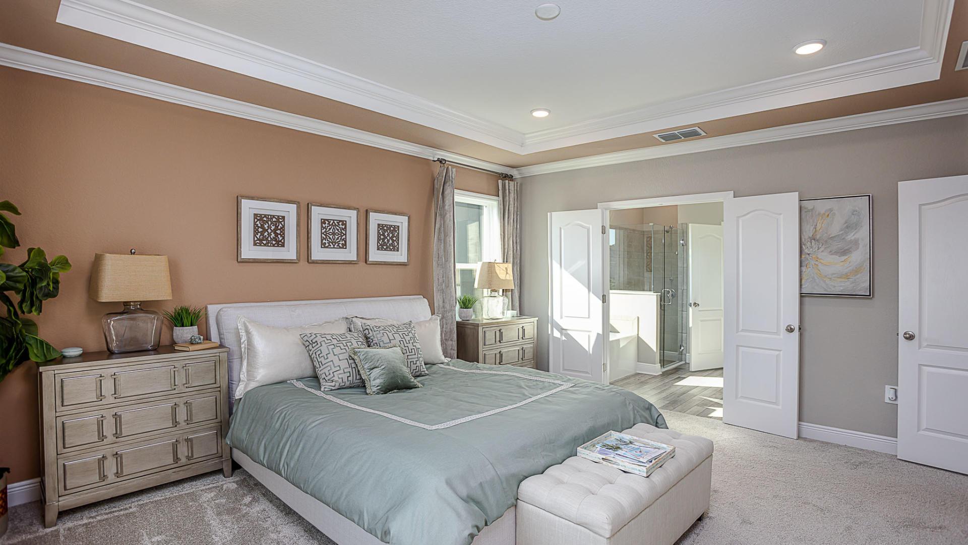 Master bedrooms with walk-in closets and modern bathrooms.