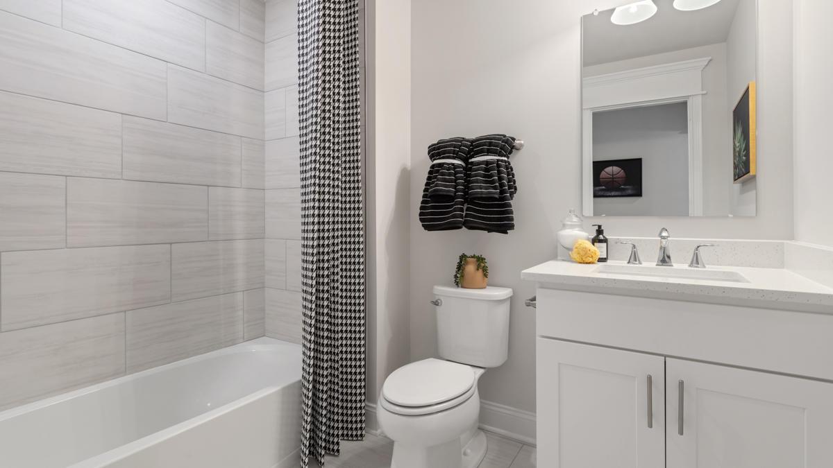 With the option of multiple baths in your new home, everyone can have their own space to get ready.