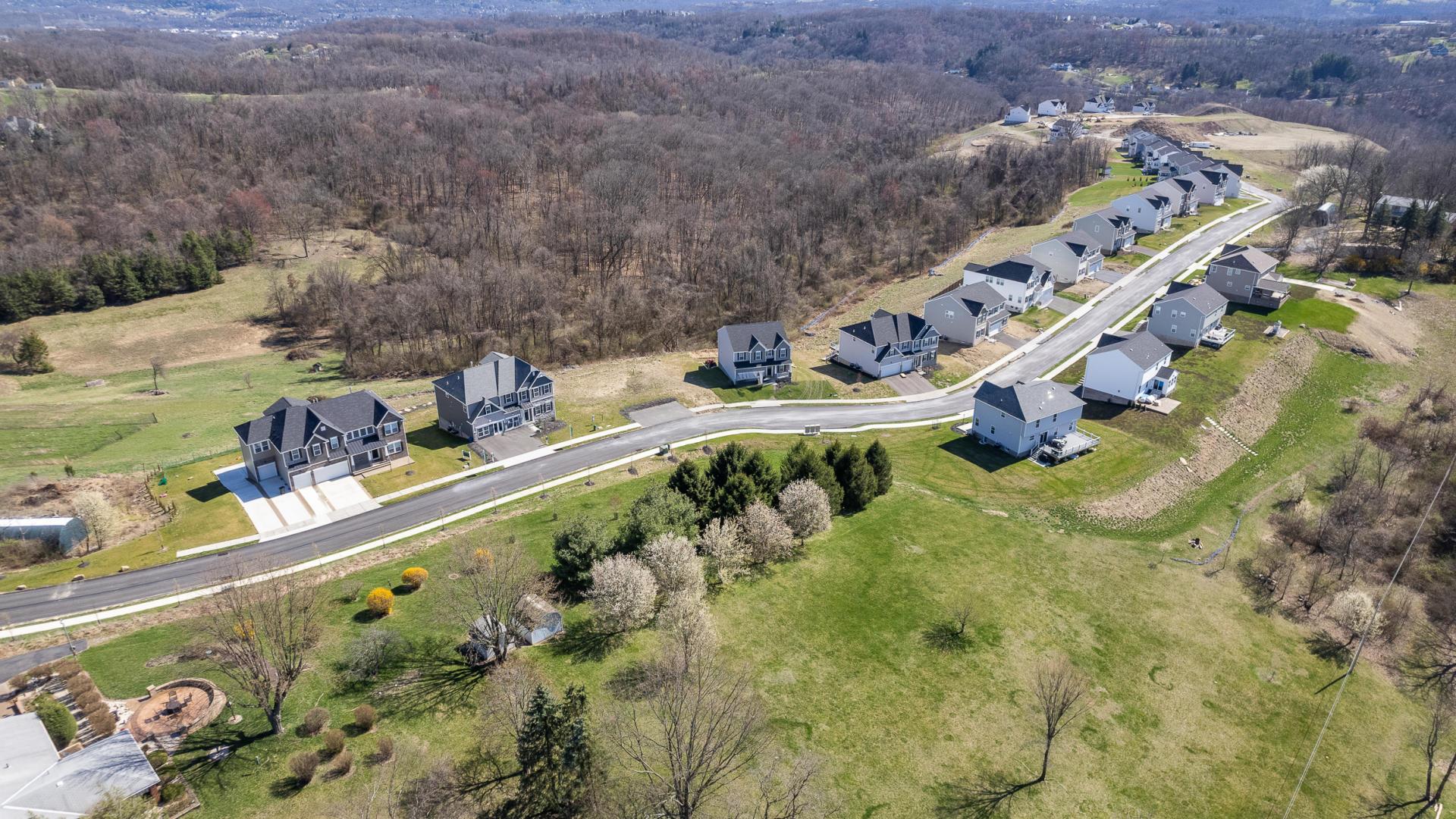 Enjoy wooded homesites with beautiful backyard views.