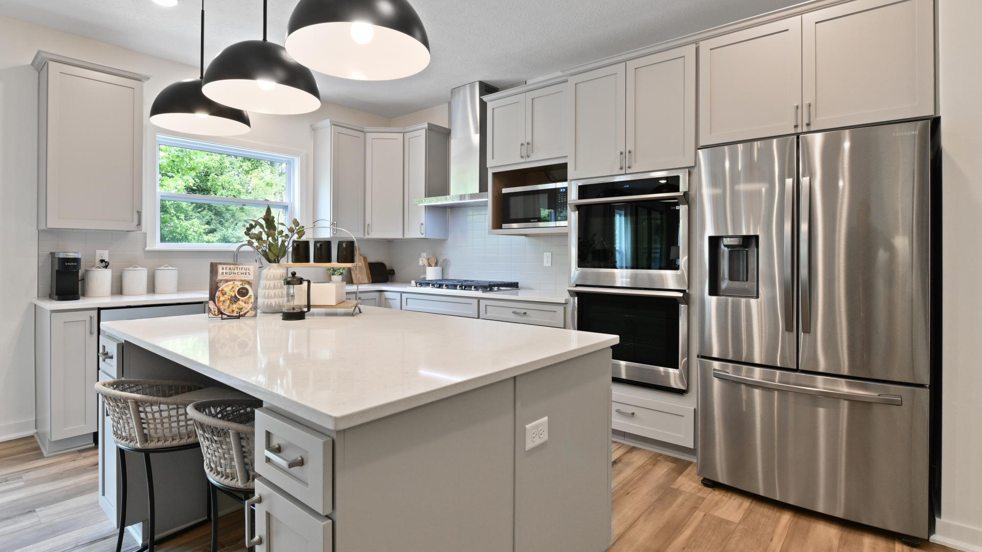 Spacious and modern chef's kitchens with stainless steel Samsung Appliances.