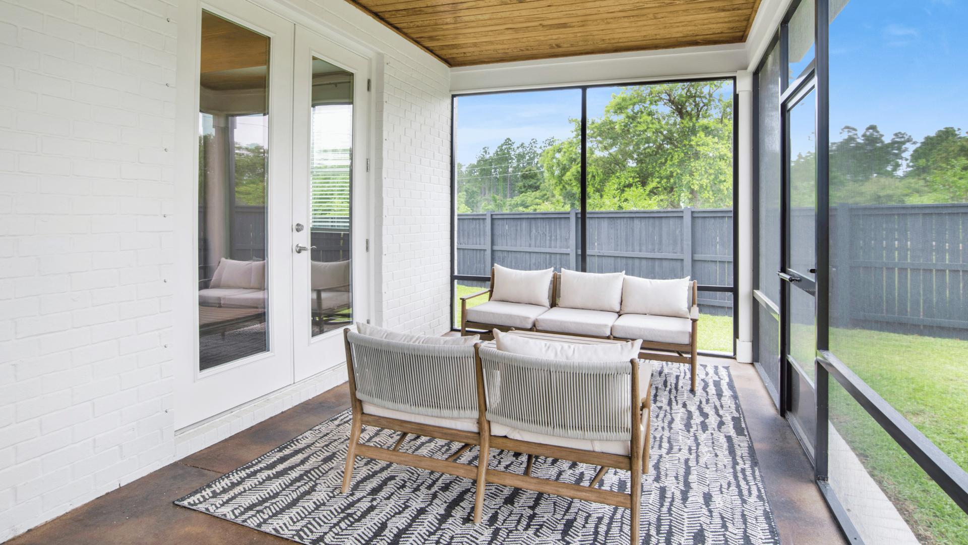 Have morning coffee out in your sunroom and take in the views of your private backyard.