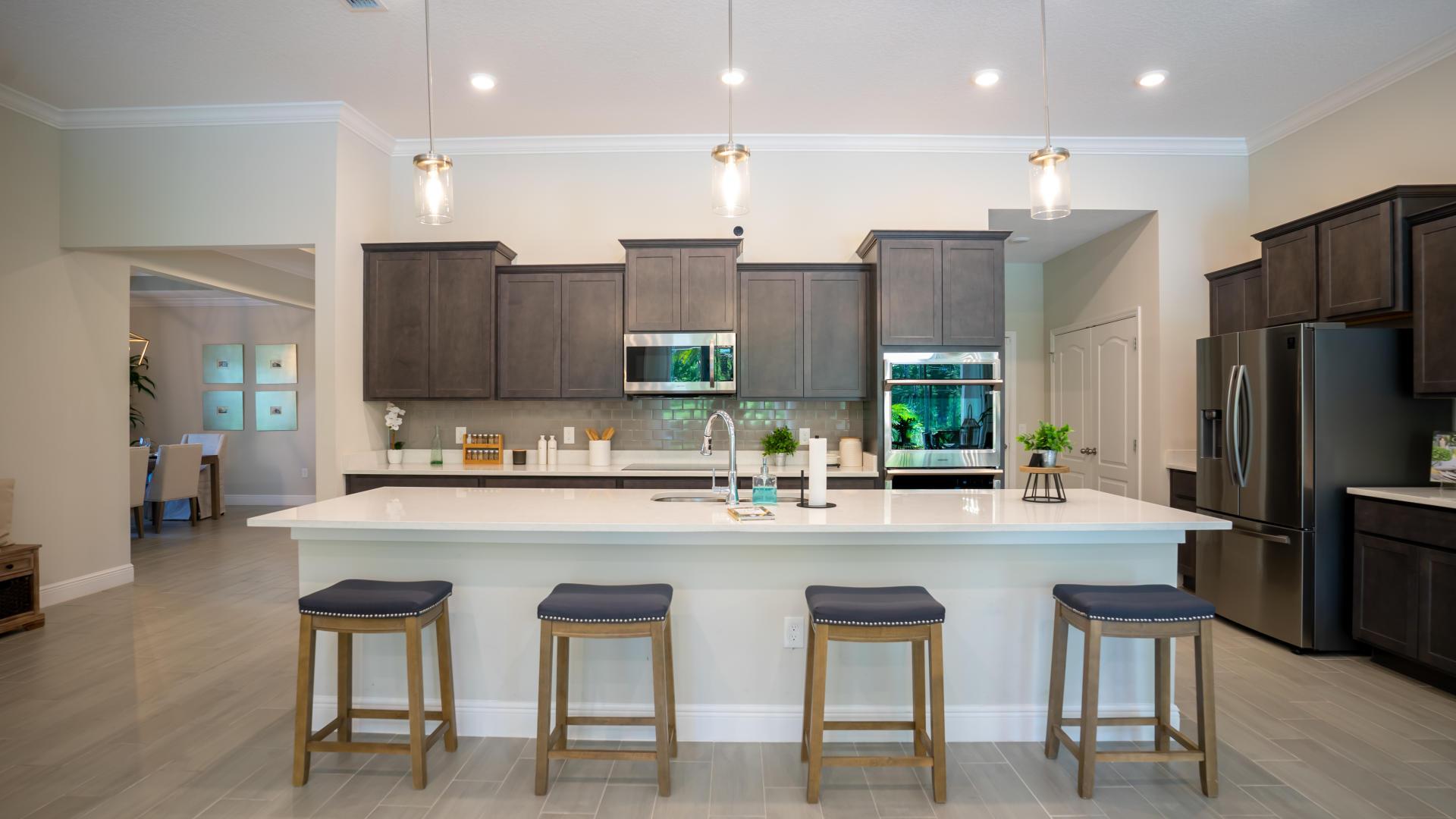 Spacious and modern kitchens with stainless steel Samsung Appliances.