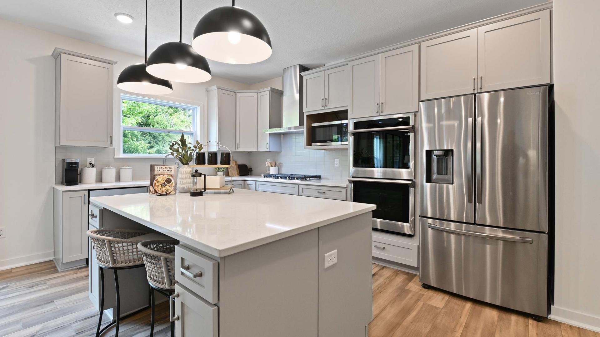 Your new kitchen will feature stainless steel appliances and a spacious island for cooking and entertaining.