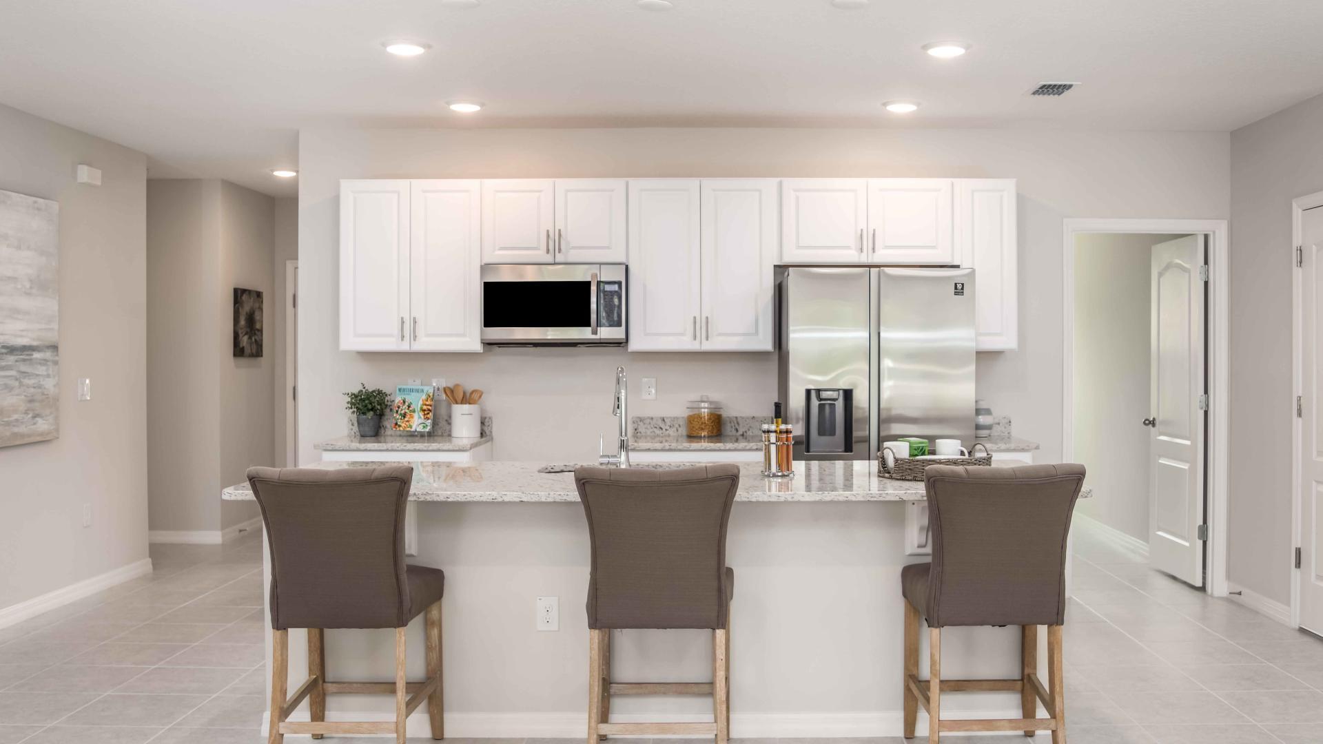 Cook your favorites on stainless steel appliances featured in Inverness.