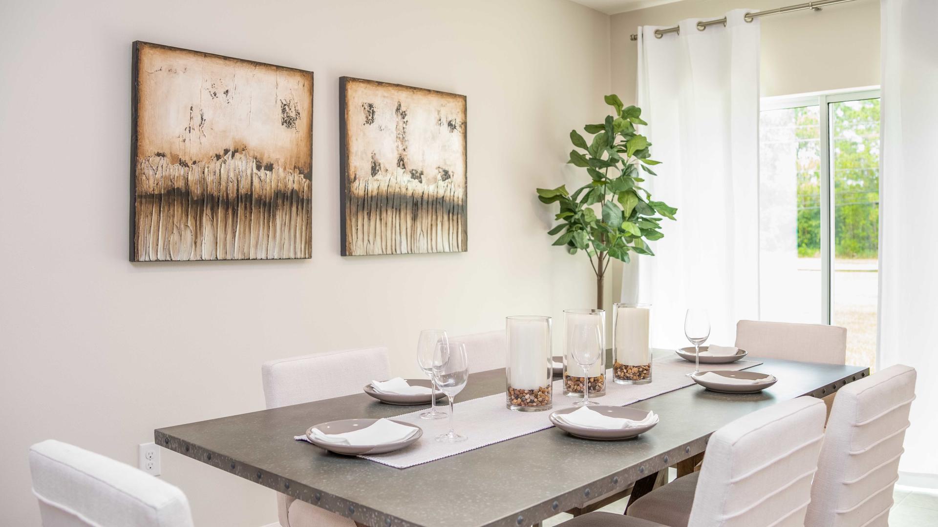 The perfect space to host loved ones in a dining room that flows seamlessly from the kitchen.