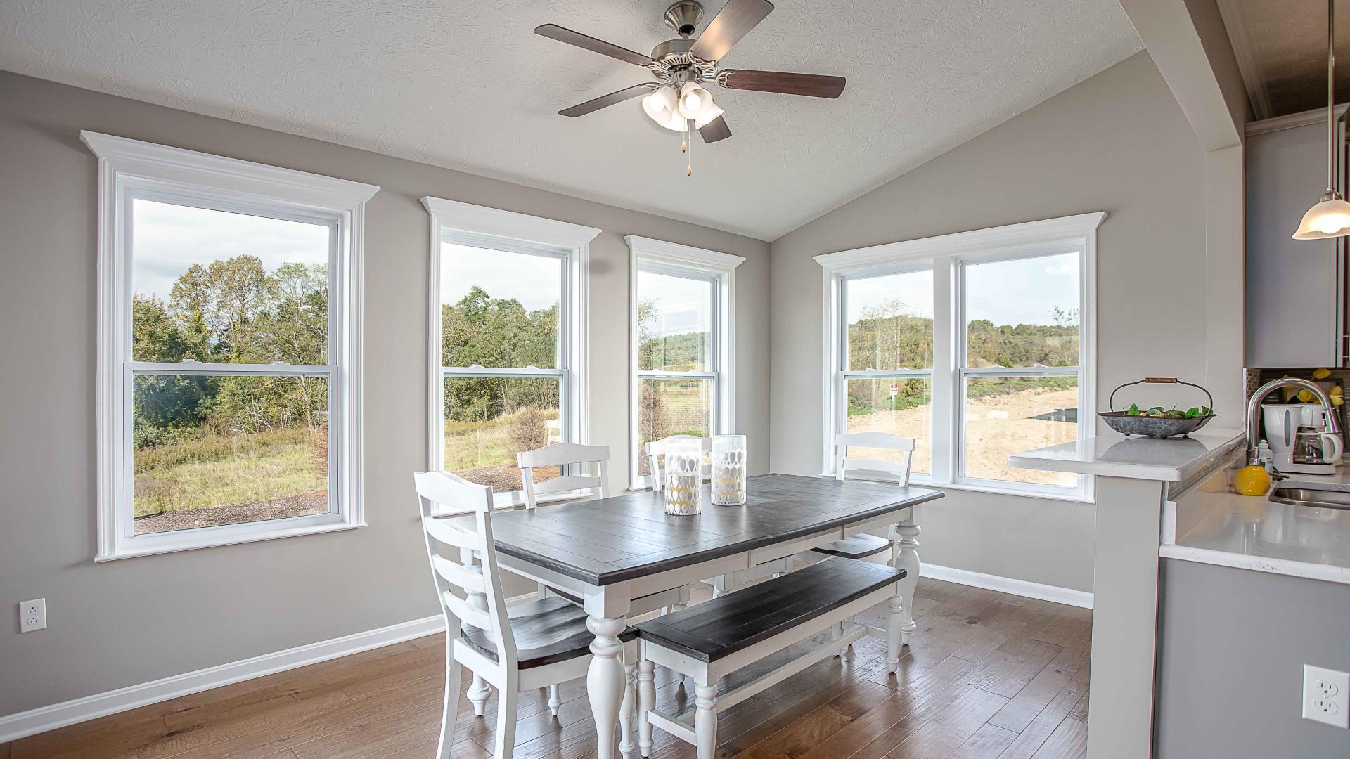 Add a sunroom for more natural light and extra space for entertaining or casual dining.