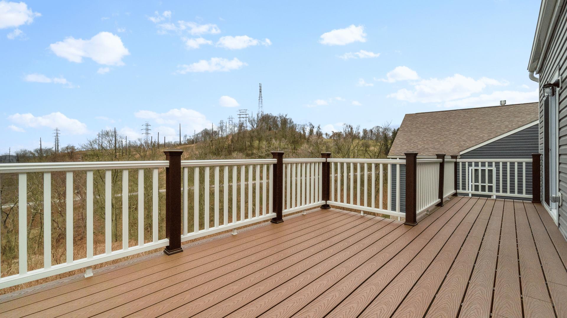 Enjoy a cup of coffee in the morning or glass of wine after a long day on your new porch.