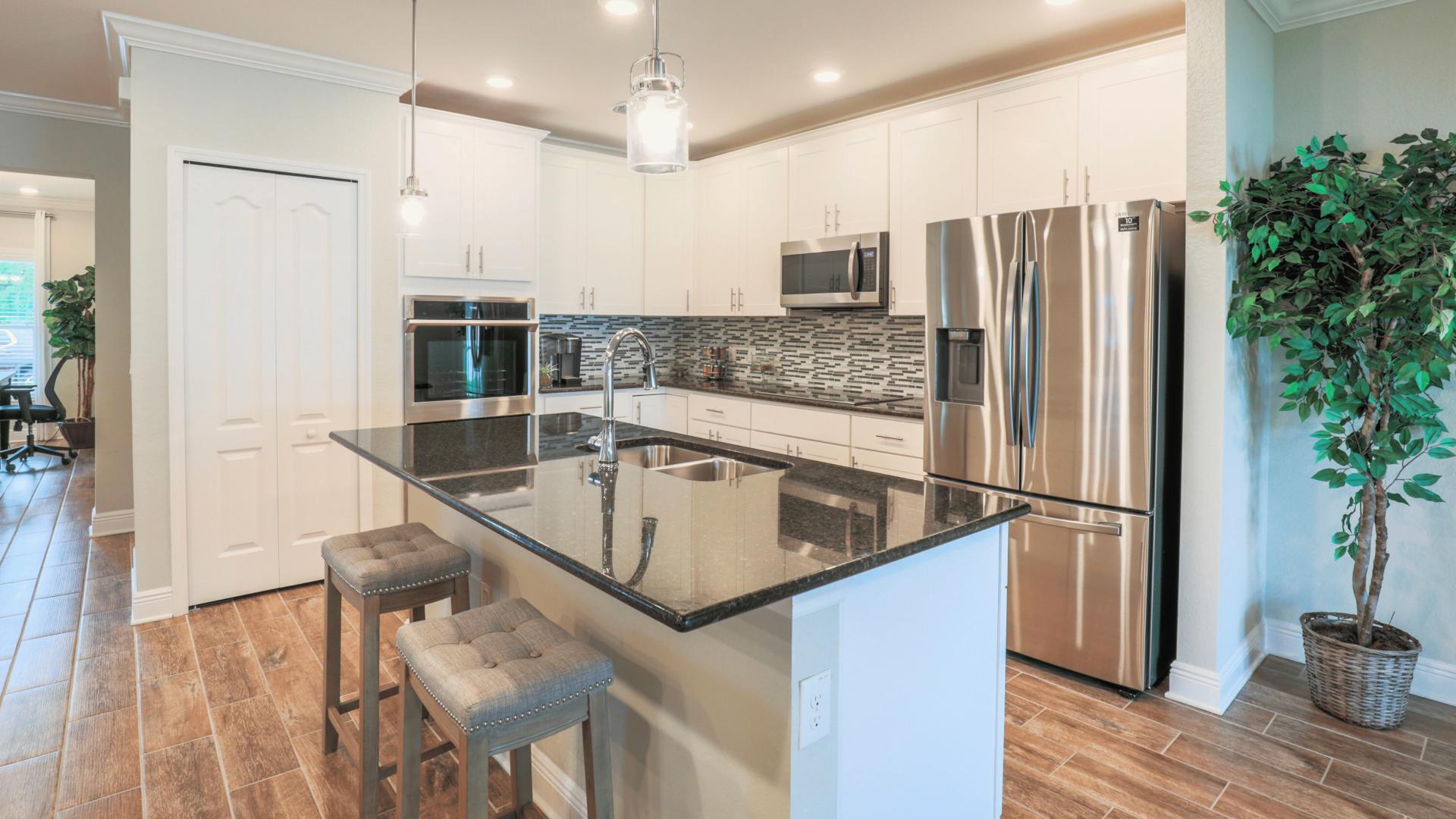 Your new kitchen has it all - islands with ample storage, stainless steel appliances, and more!
