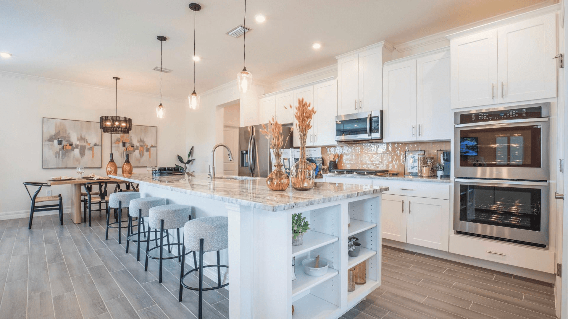 Your new kitchen has it all - Granite countertops, a functional island, and stainless steel appliances.