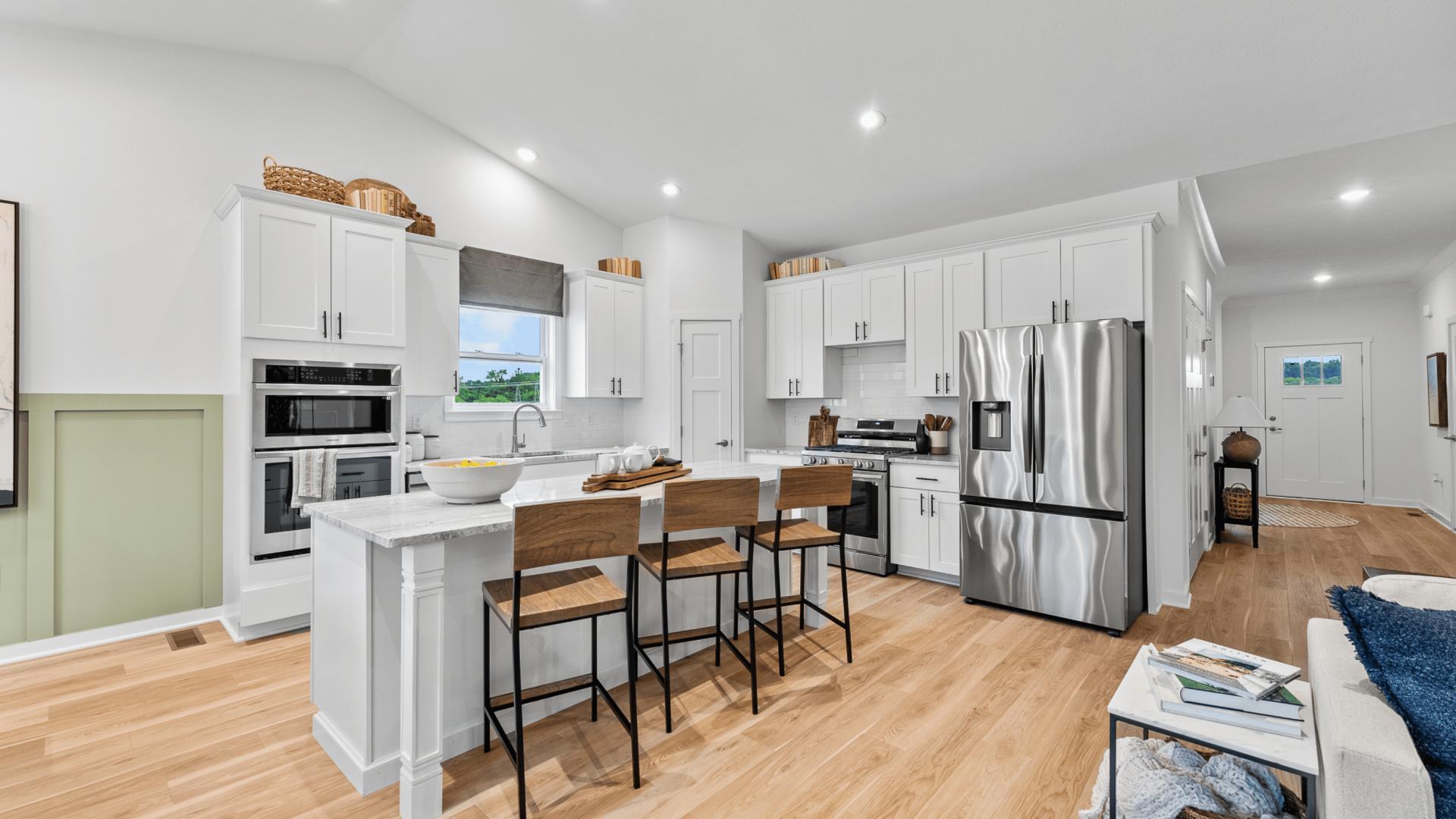 The luxury features you expect are included – LVP flooring, granite countertops and kitchen islands.