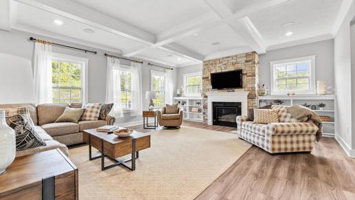 Enjoy your coffee in a sunlit living room with unmatched natural light.