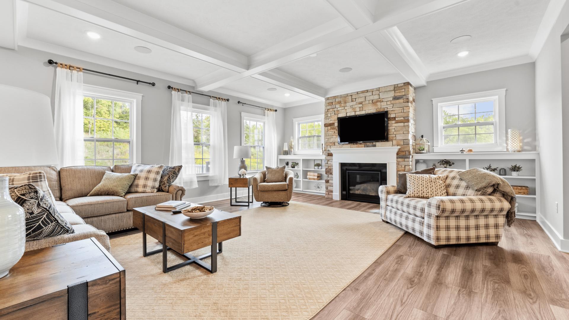 Enjoy your coffee in a sunlit living room with unmatched natural light.