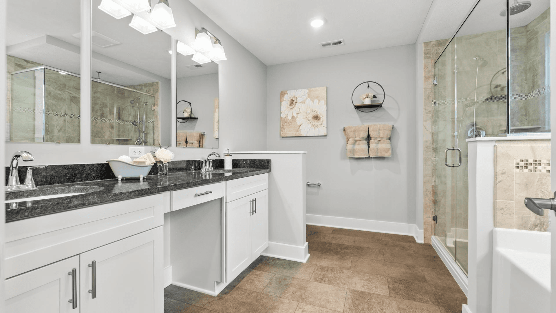 Unwind in your personal oasis with a master bath right in your bedroom.