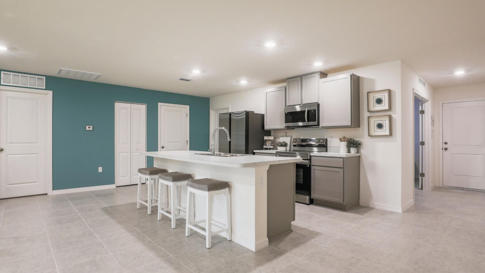 Your new kitchen will feature stainless steel appliances and a spacious island for cooking and entertaining.