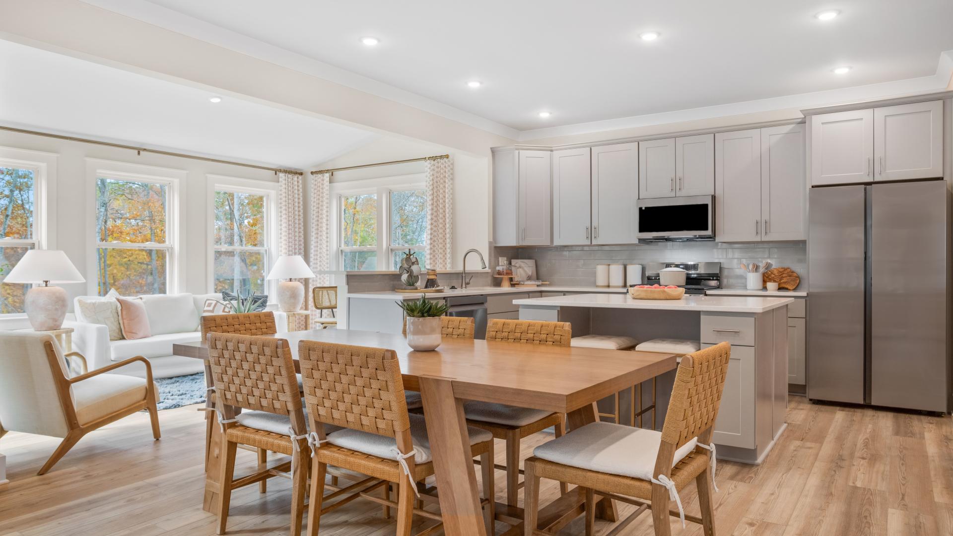 Your new kitchen has it all - Granite countertops, LVP flooring, and stainless steel appliances.