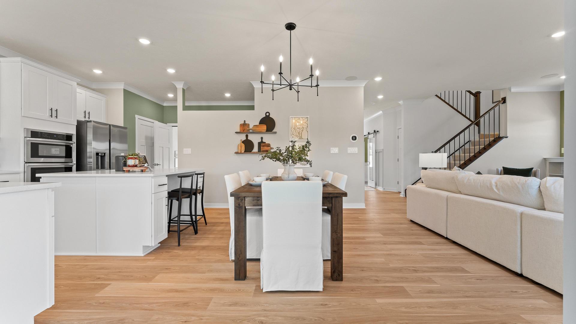 LVP Flooring, 9’ ceilings on the first floor, and open concept floor plans.