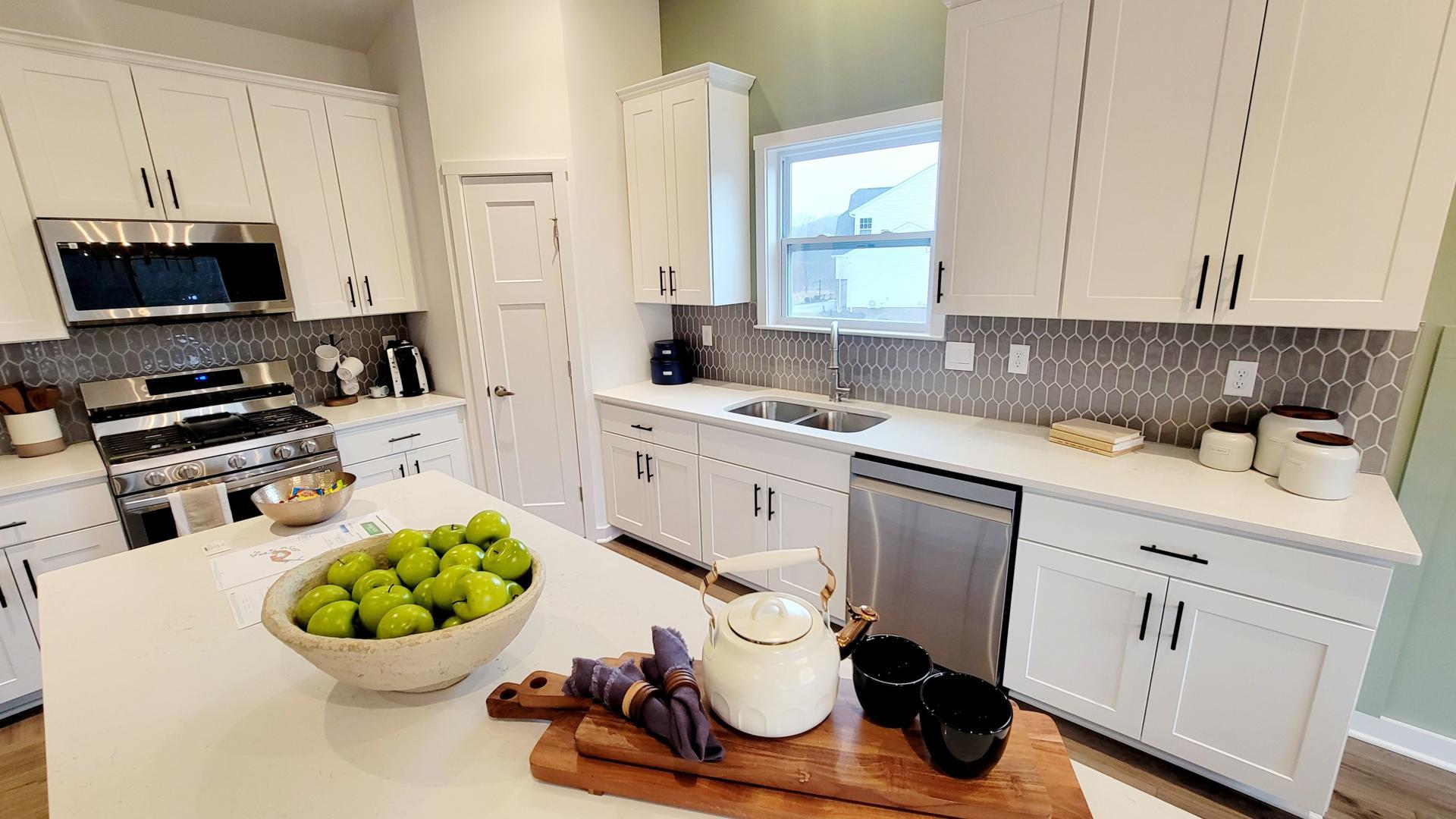 Prep dinner and hang with the family in your brand new kitchen.