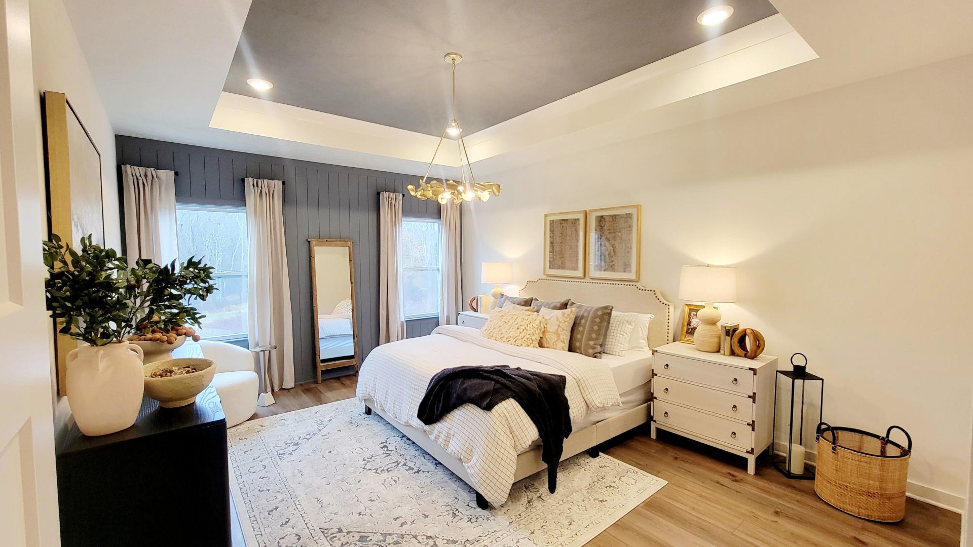 Luxurious master suites with spacious, walk-in closets are included.