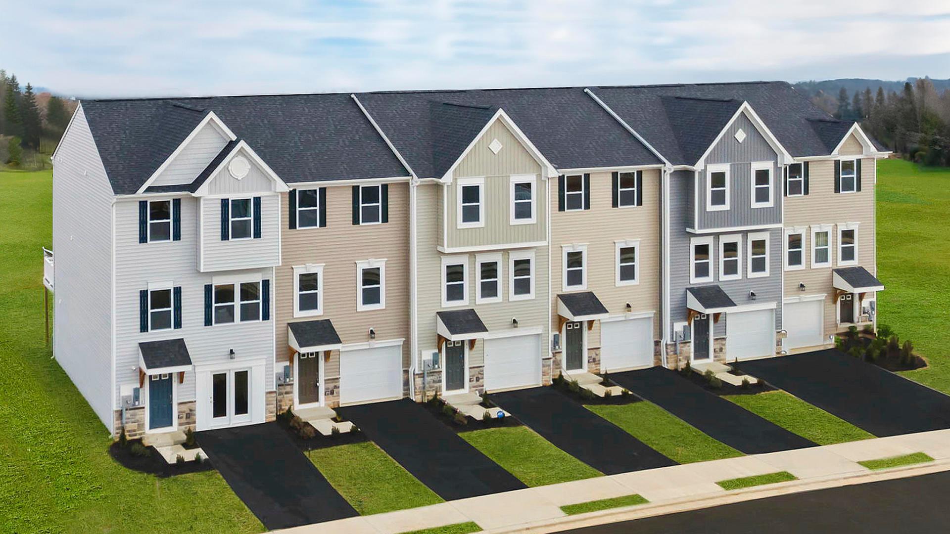 Introducing Huntwell West Townhomes, the largest front load garage 3 and 4-bedroom townhomes in West Virginia's fastest-growing area with 40-60 ft backyards!