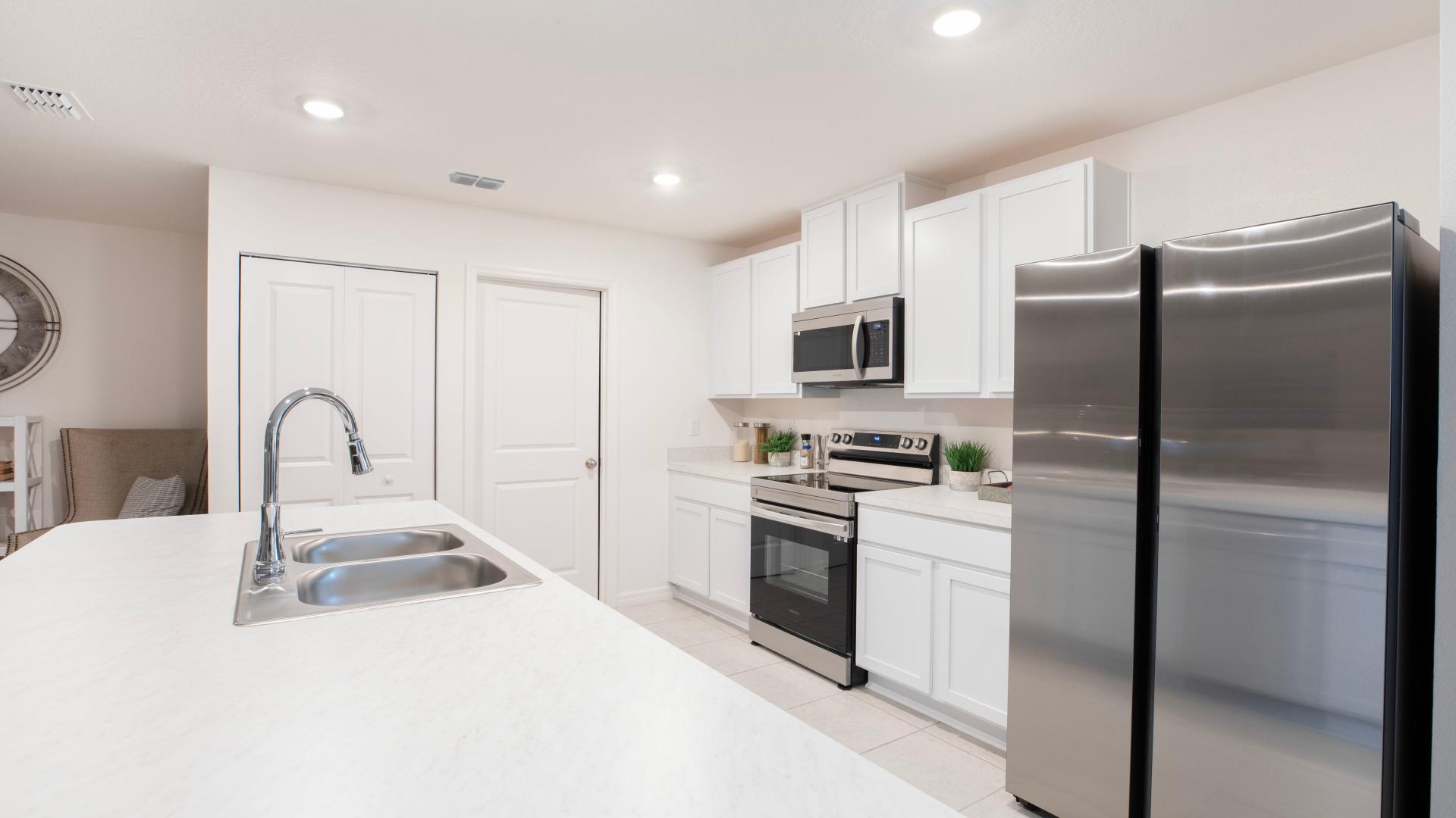 You love your stainless steel appliances and spacious kitchen island.