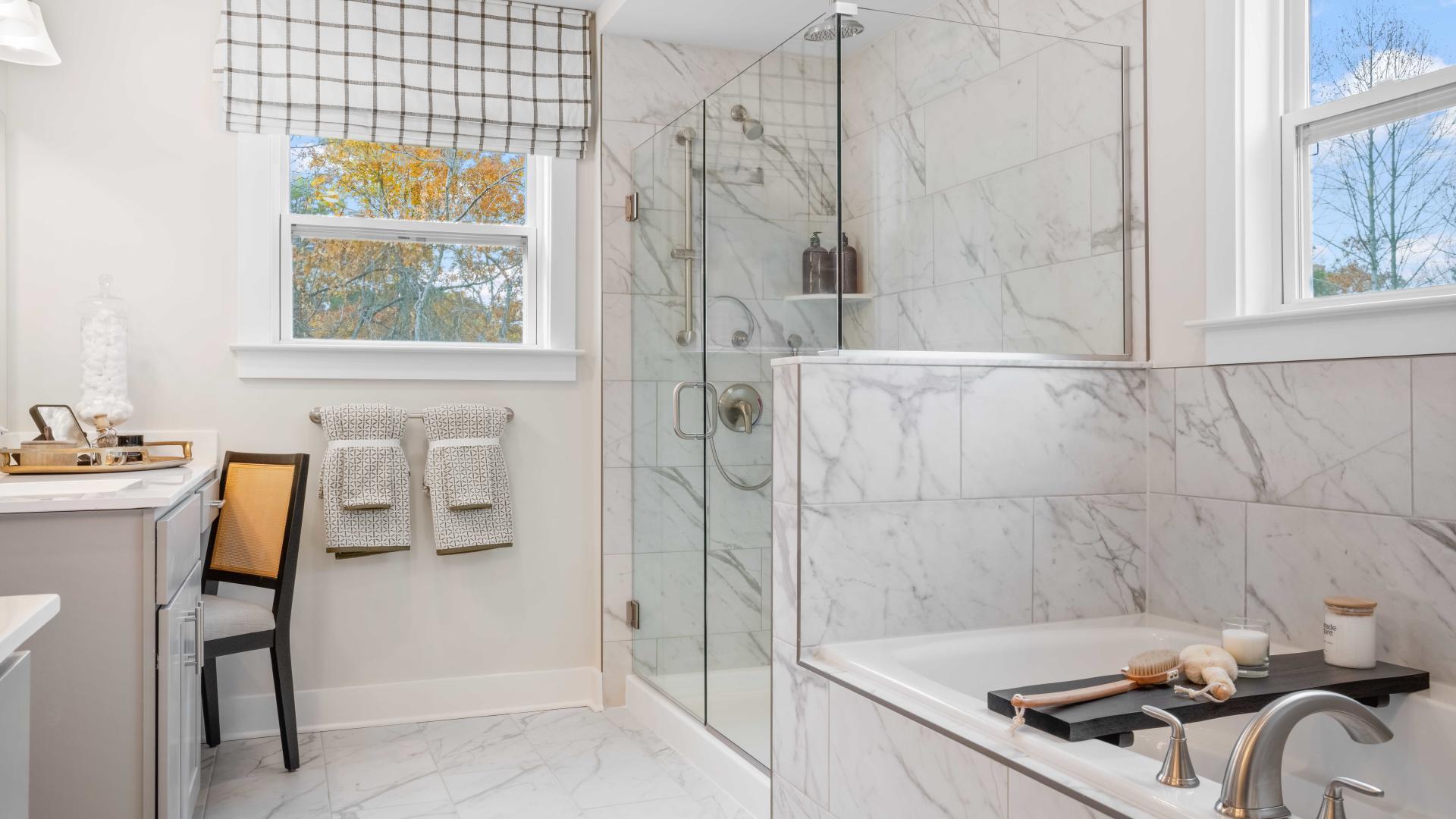 Your new home will include a frameless rain shower and create a spa like master bath.