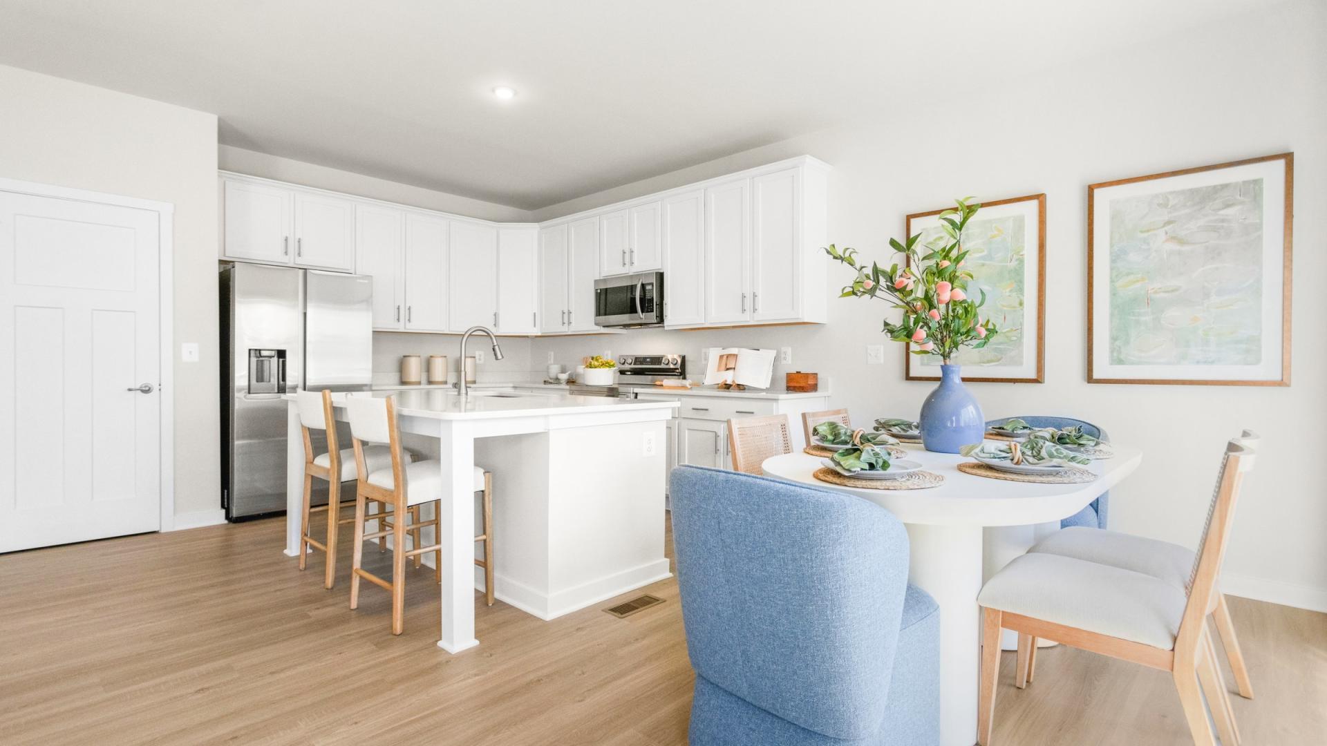 Your new kitchen has it all - Granite countertops, LVP flooring, and stainless steel appliances.