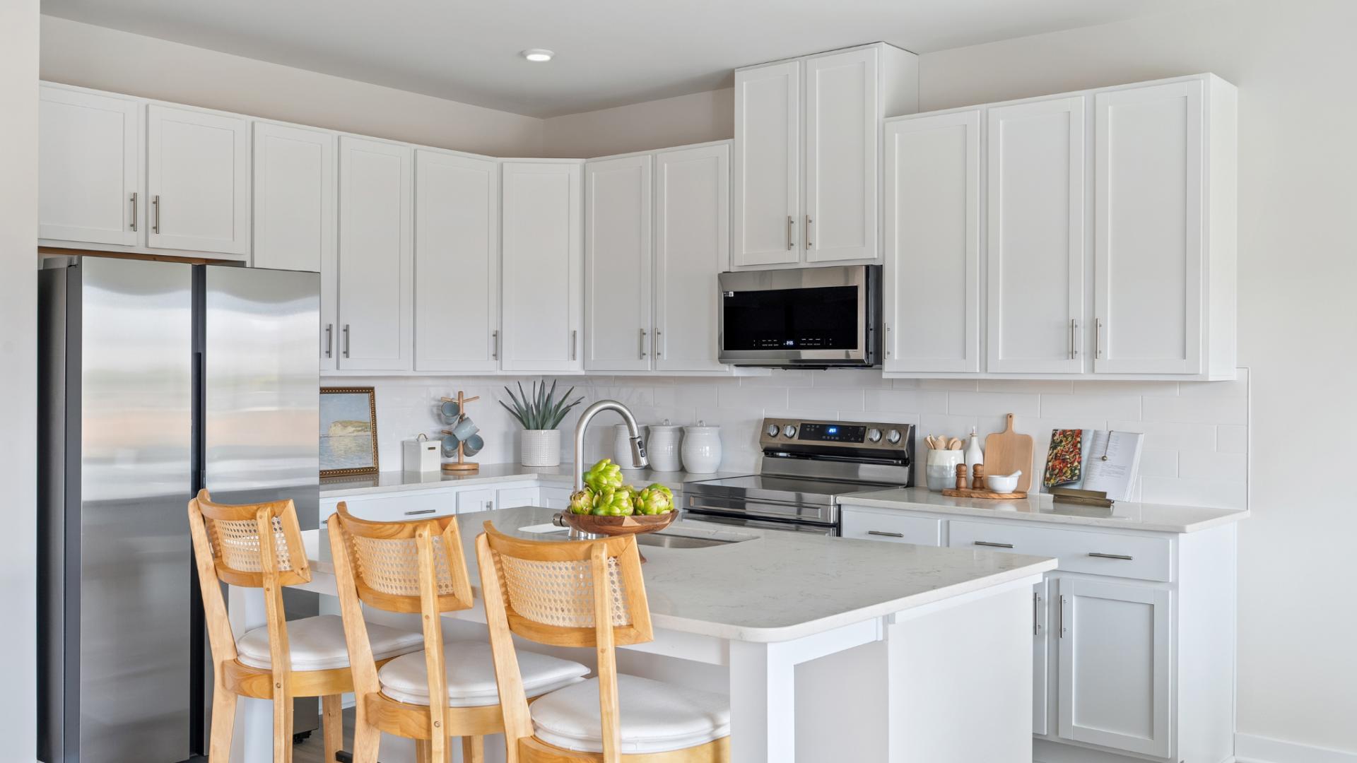 Kitchen island included and you can select a double wall oven.