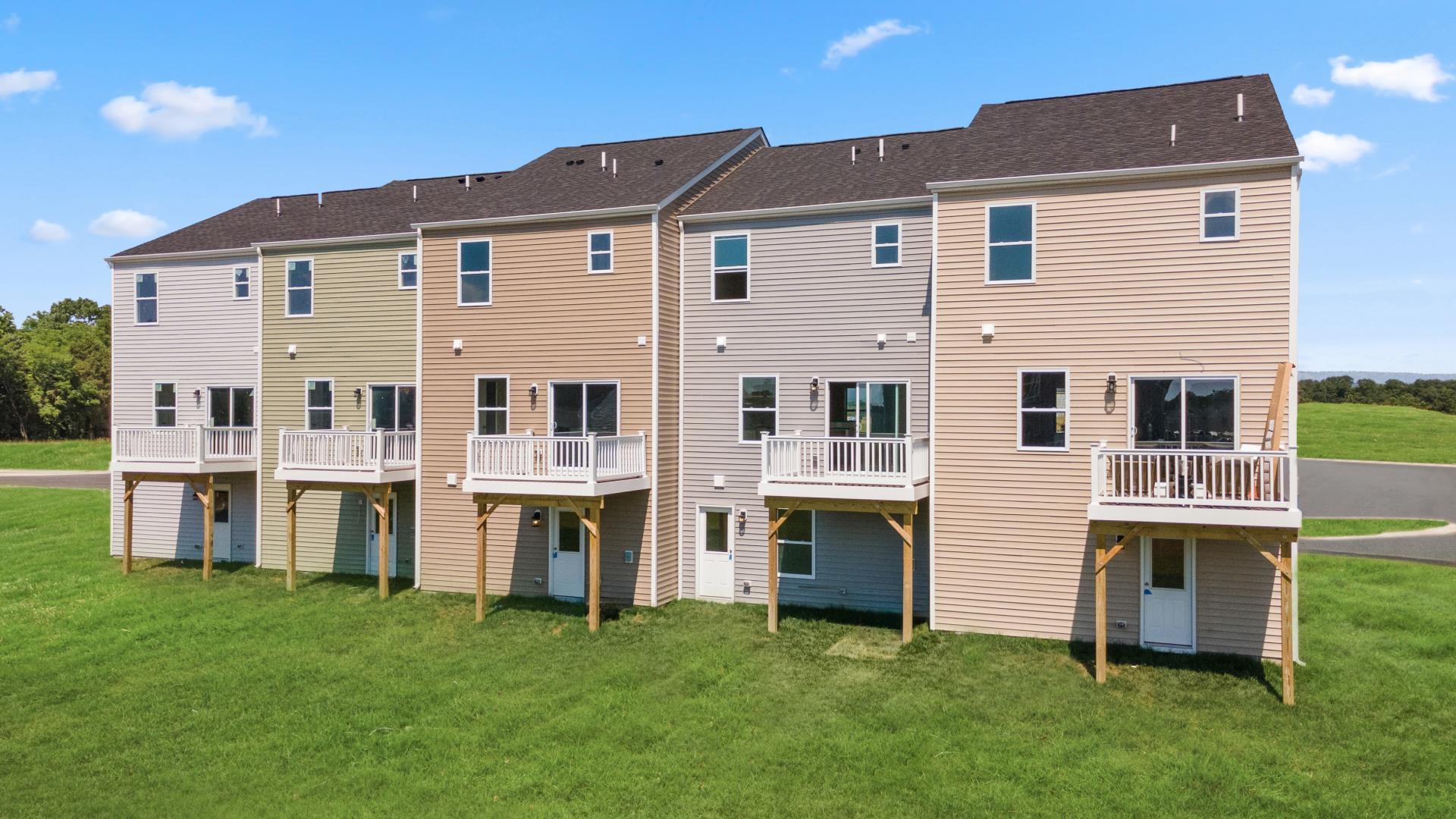 Add a deck outside for more space to soak in the sun &amp; host family and friends.