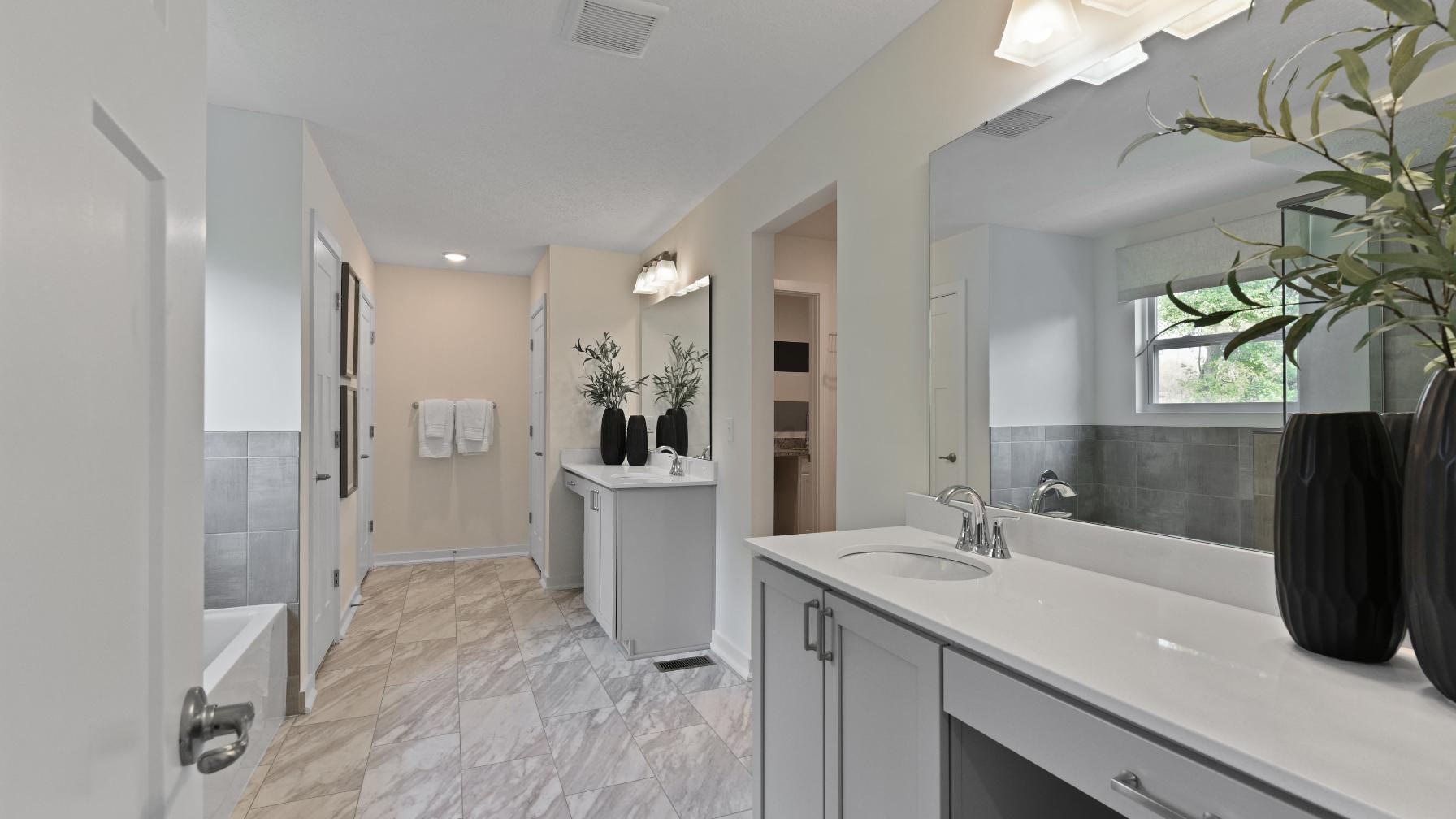 Luxurious master baths with frameless walk-in showers and plenty of storage space for your everyday essentials.