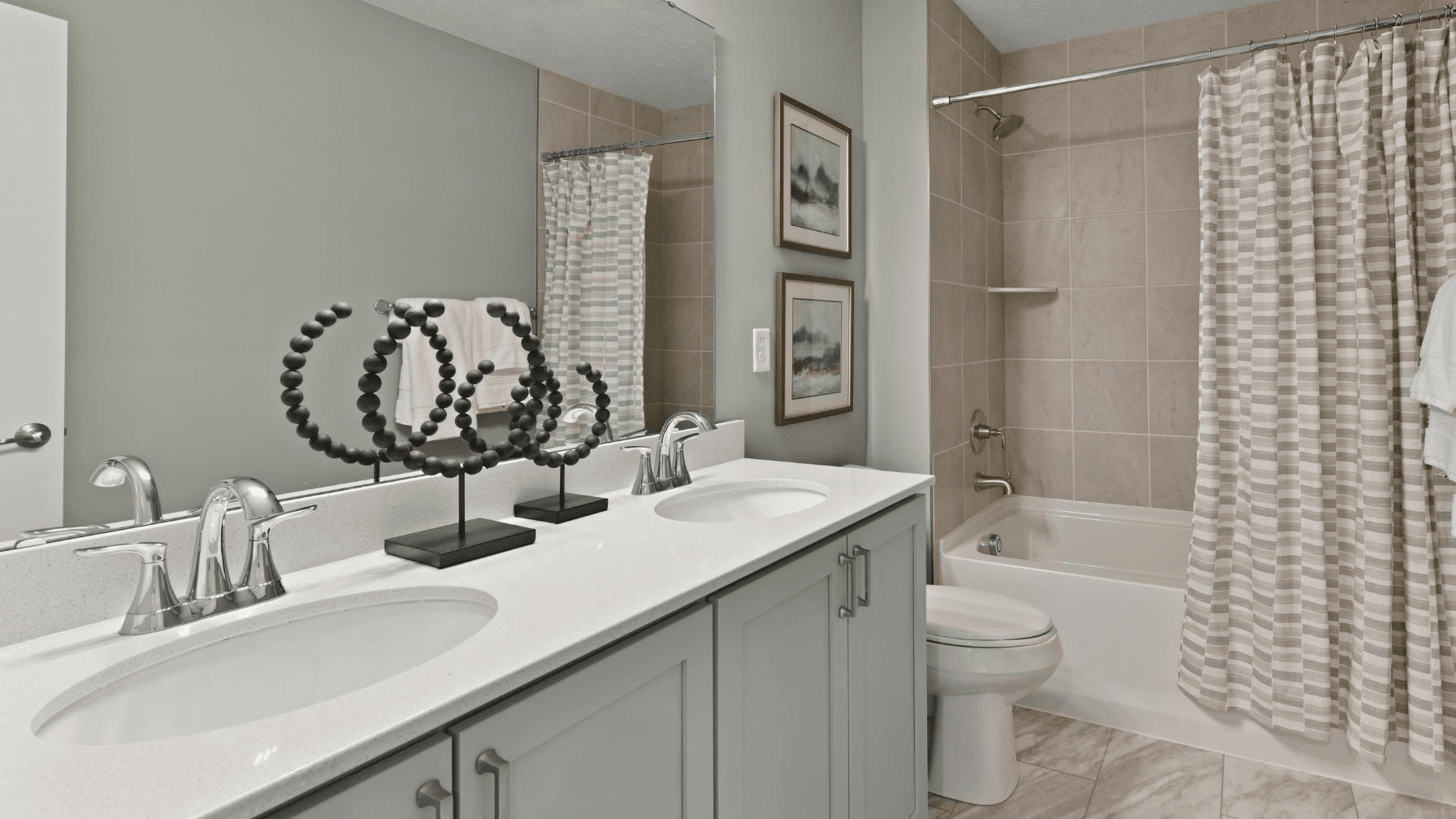 With the option of multiple baths in your new home, everyone can have their own space to get ready.