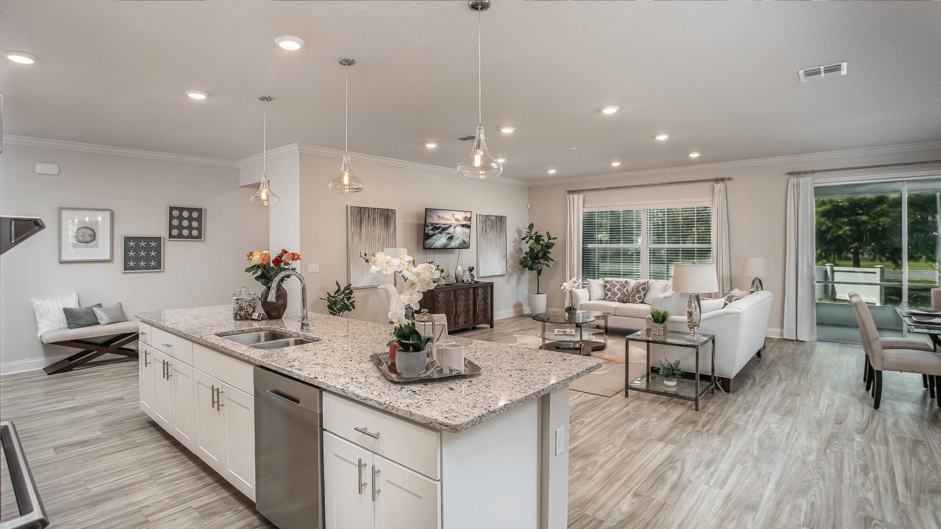 Open floor plans makes it easy to make dinner and still be together with family and friends.