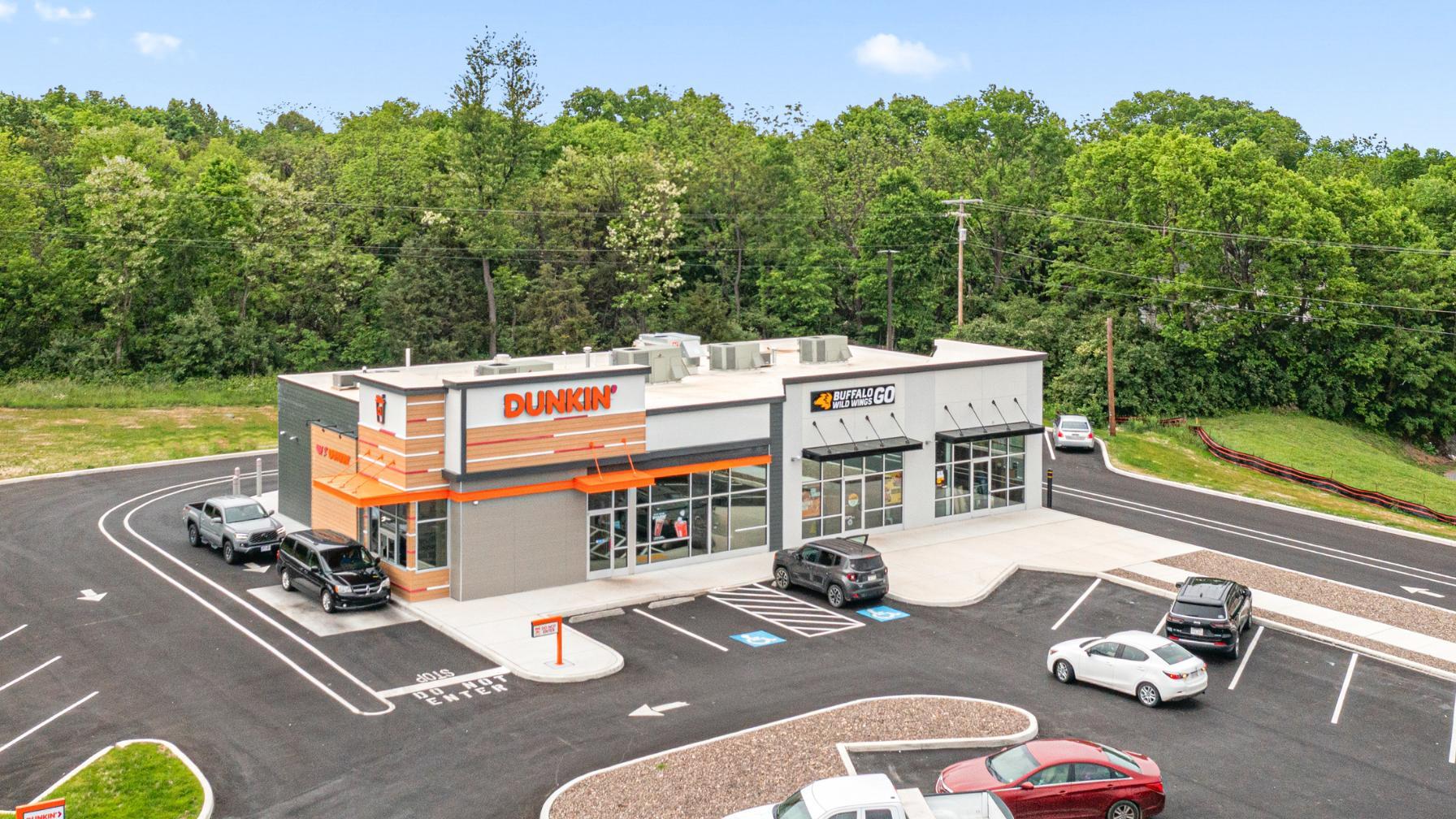 Dunkin Donuts is nearby for a morning coffee run.