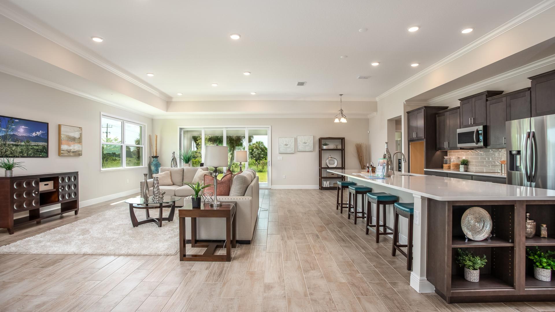 Your new kitchen has it all - Granite countertops, LVP flooring, and stainless steel appliances.