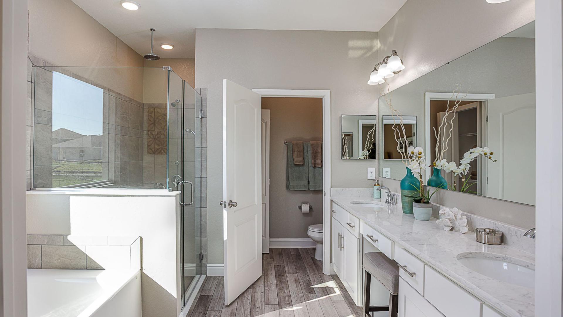 Your master bathroom includes dual vanities, modern colors and features making mornings much easier.