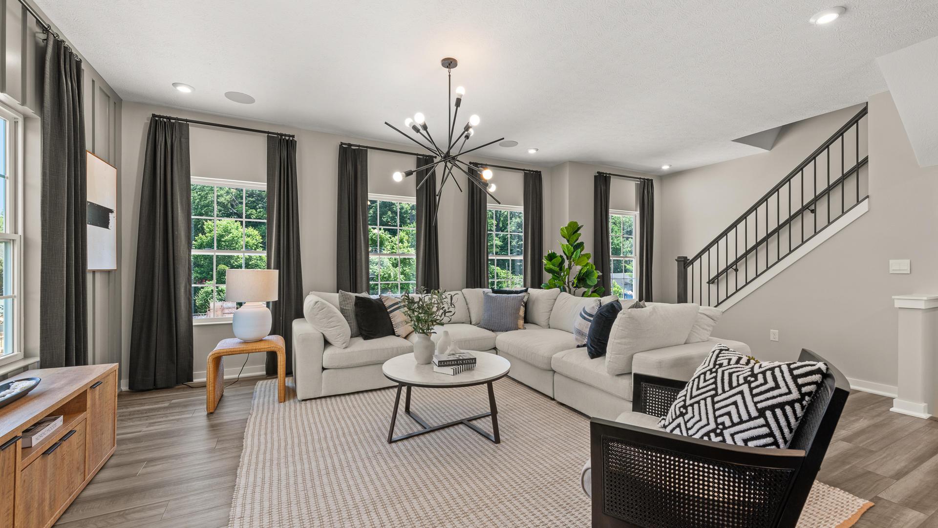 Natural light pours in, elegance radiates out—this townhome lives like a luxury retreat.