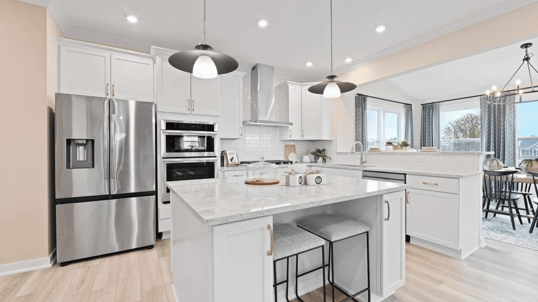 Choose a design with white cabinets, quartz countertops, and 9’ ceilings included.