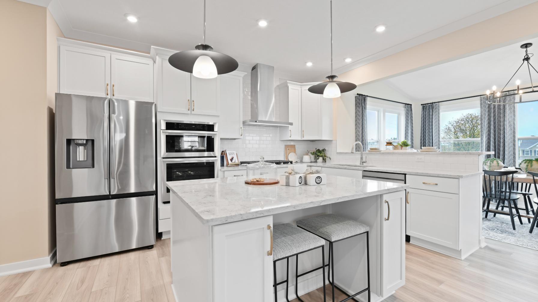 Choose a design with white cabinets, quartz countertops, and 9’ ceilings included.