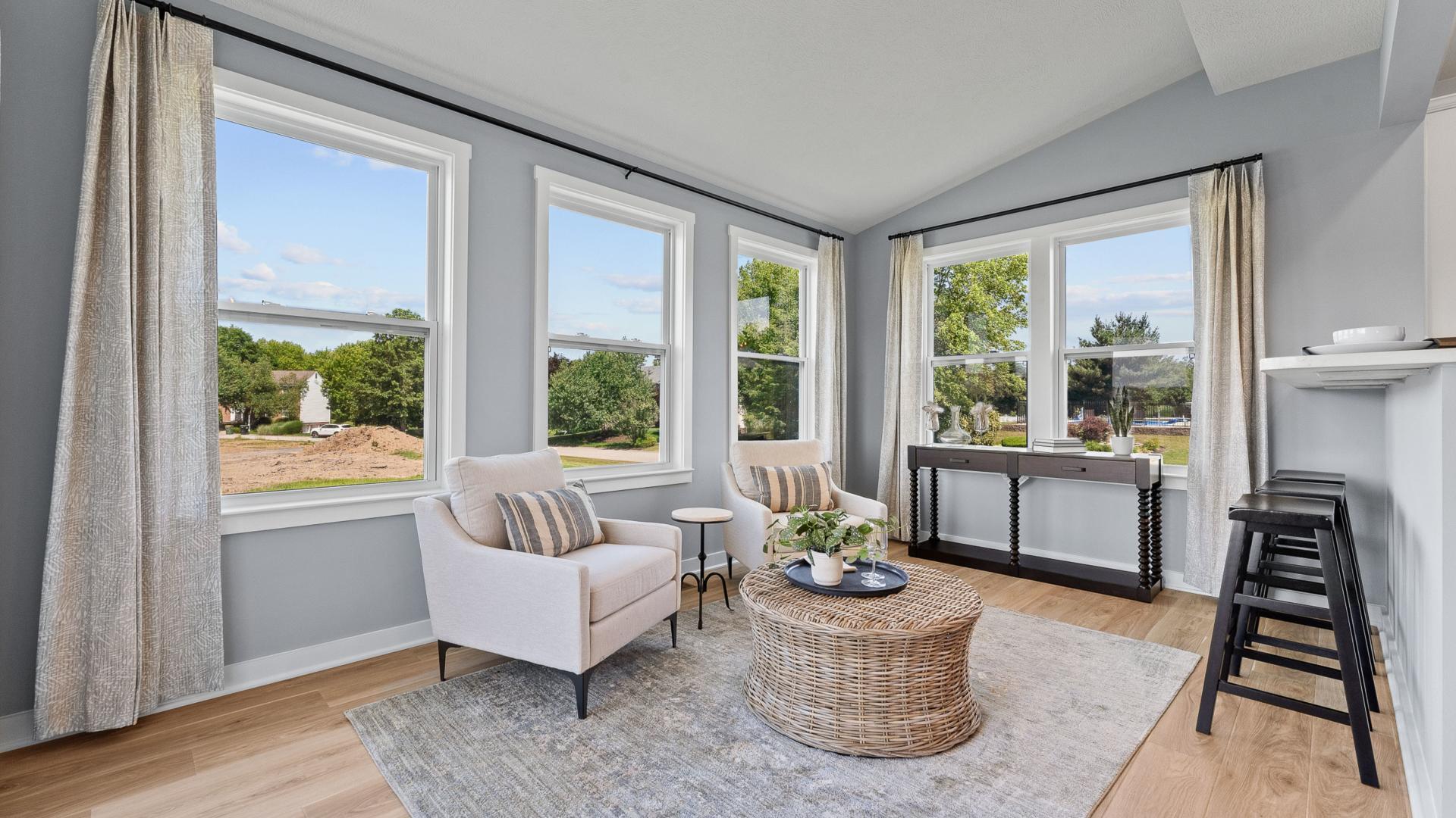Relax in a light-filled sunroom with your morning coffee or add a farm table for extra dining space.
