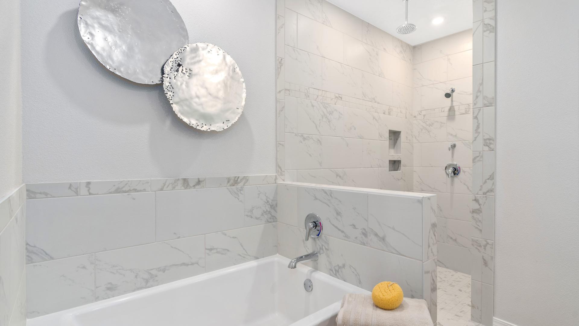 Master bedroom w/ soaking tub, frameless shower &amp; retreat—your private space to recharge daily.
