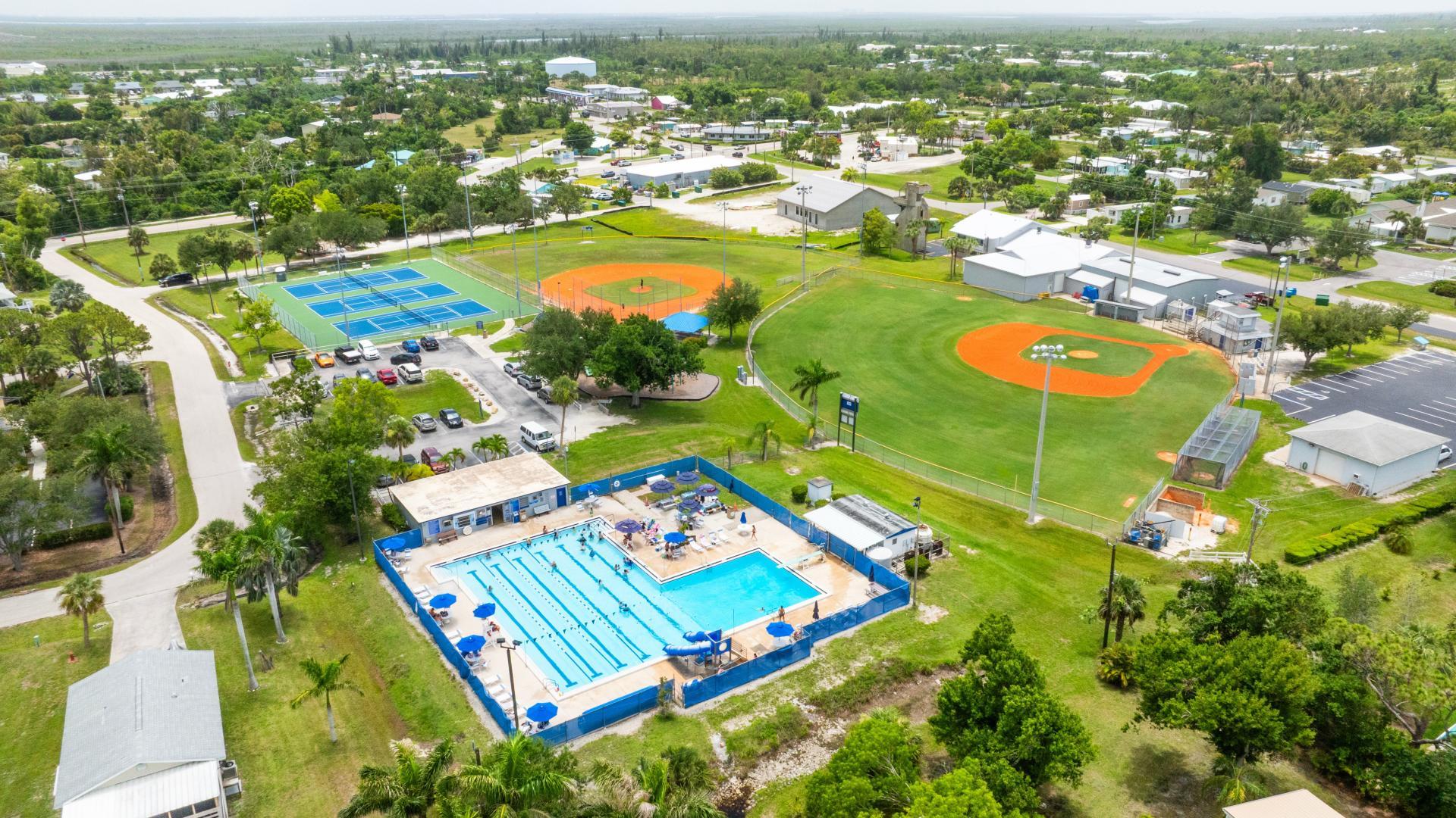 Tennis, pickleball, playground, pool &amp; more—Phillips Park has fun for all, just minutes away!